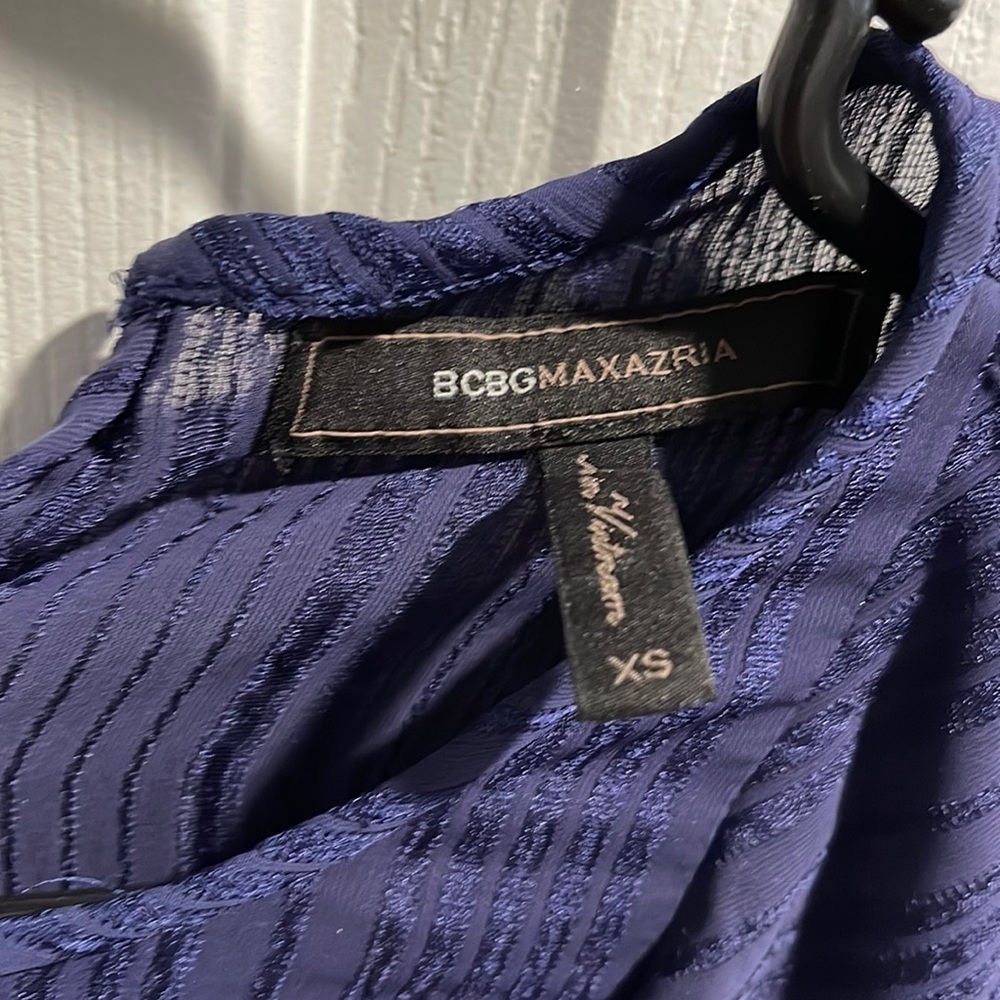 Bcbg light weight top can dress up or down